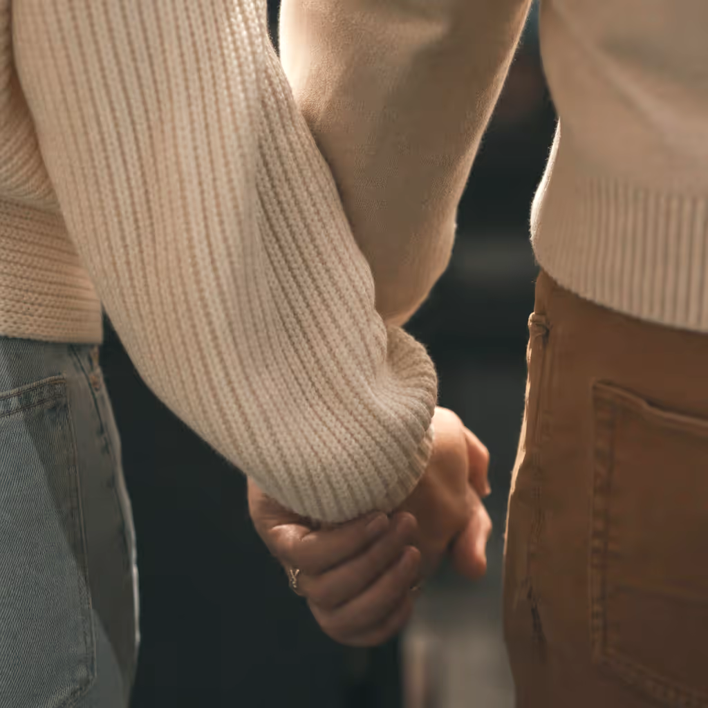 Close-up of a couple holding hands
